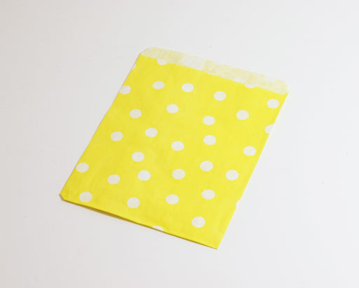Creez avec sachet cadeau en papier jaune à pois 13x18cm