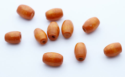 Vente au détail perles en bois x10 olives orange 7x4mm