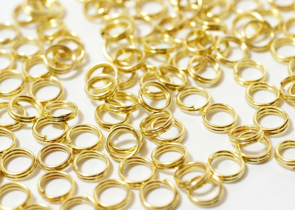 Vente anneaux doubles x100 dorés ouverts 5mm