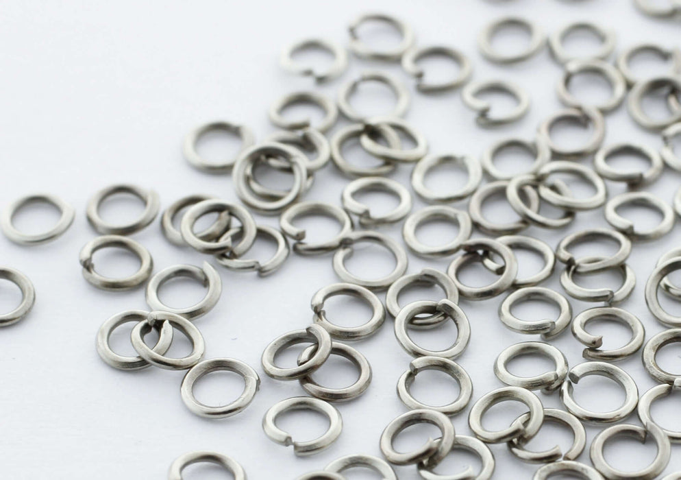 Vente en gros anneaux ouverts platine x100 3mm x 0.6 mm