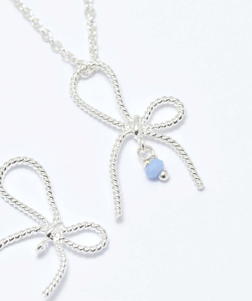 Achat 2 pendentifs couleur argent noeud connecteur 26x13x3 mm, trou: 2 mm fin et délicat idéal en ajoutant une perle