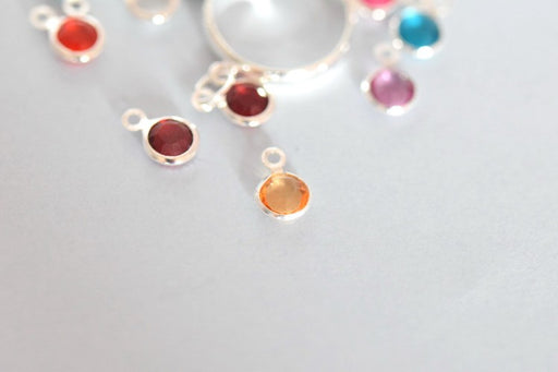 Vente au détail mini pendentif perle en verre à facettes orange topaze clair 6 mm avec contours argentés