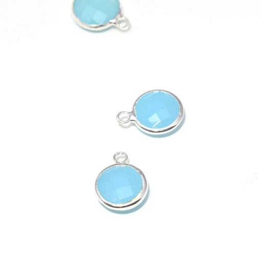 Achat 1 pendentif argent 14x11x5 mm, Trou: 2 mm et verre à facettes bleu clair opaque avec contours argentés