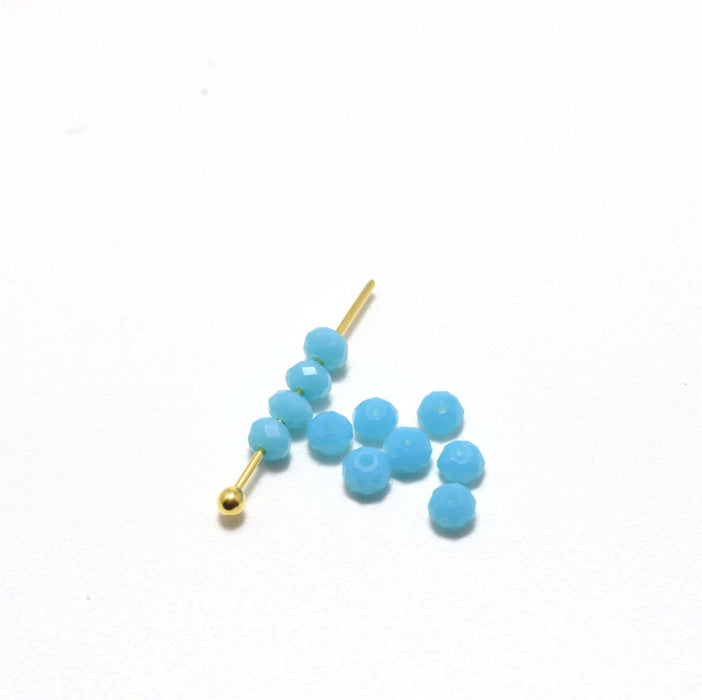Vente en gros 10 perles bleu turquoise à facettes en verre imitation jade 3.5~4x2.5~3mm trou: 0.5mm à enfiler à un fil un clou perlé en br