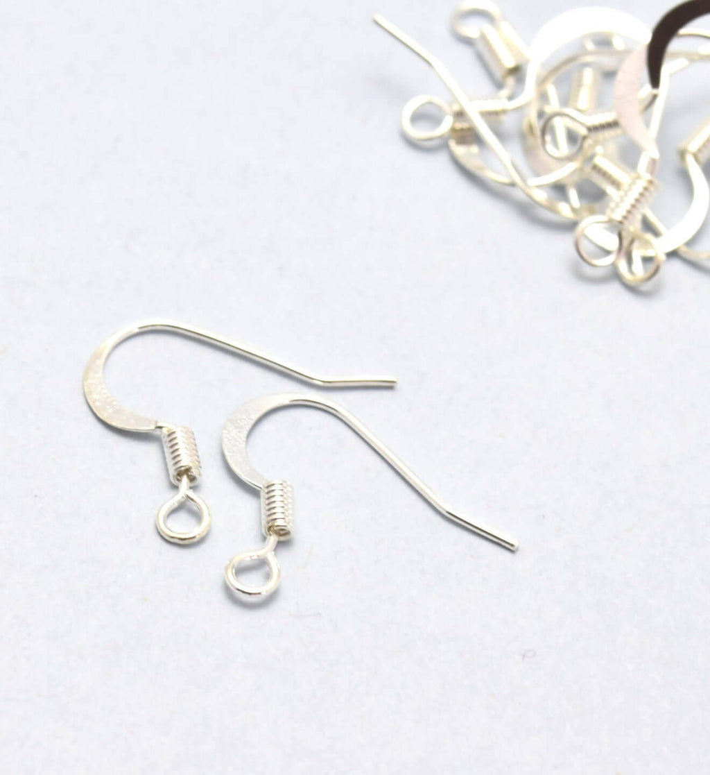 Supports boucles d'oreilles clips plateau n°06 x 10 paires acier