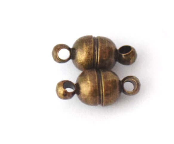 Achat au détail 1 petit fermoir magnétique bronze 11x5mm sans nickel -apprèts pour vos créations de bijoux