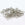 Grossiste en anneaux ouverts 7mm platine x100 - apprêts bijoux en acier inoxydable